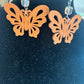 Pair of wooden butterfly earrings with crystal accents