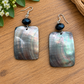 Rectangular black lip shell earrings with faceted black beads