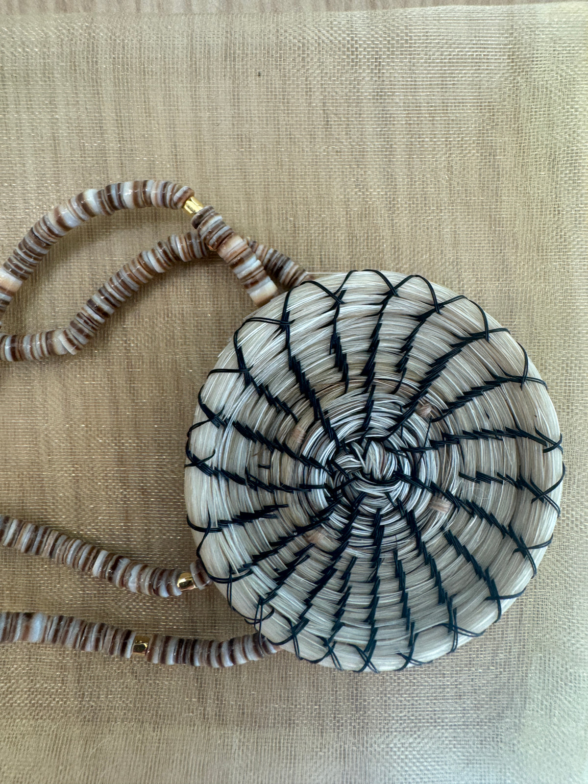Close-up of the woven horsehair bracelet and beaded sides
