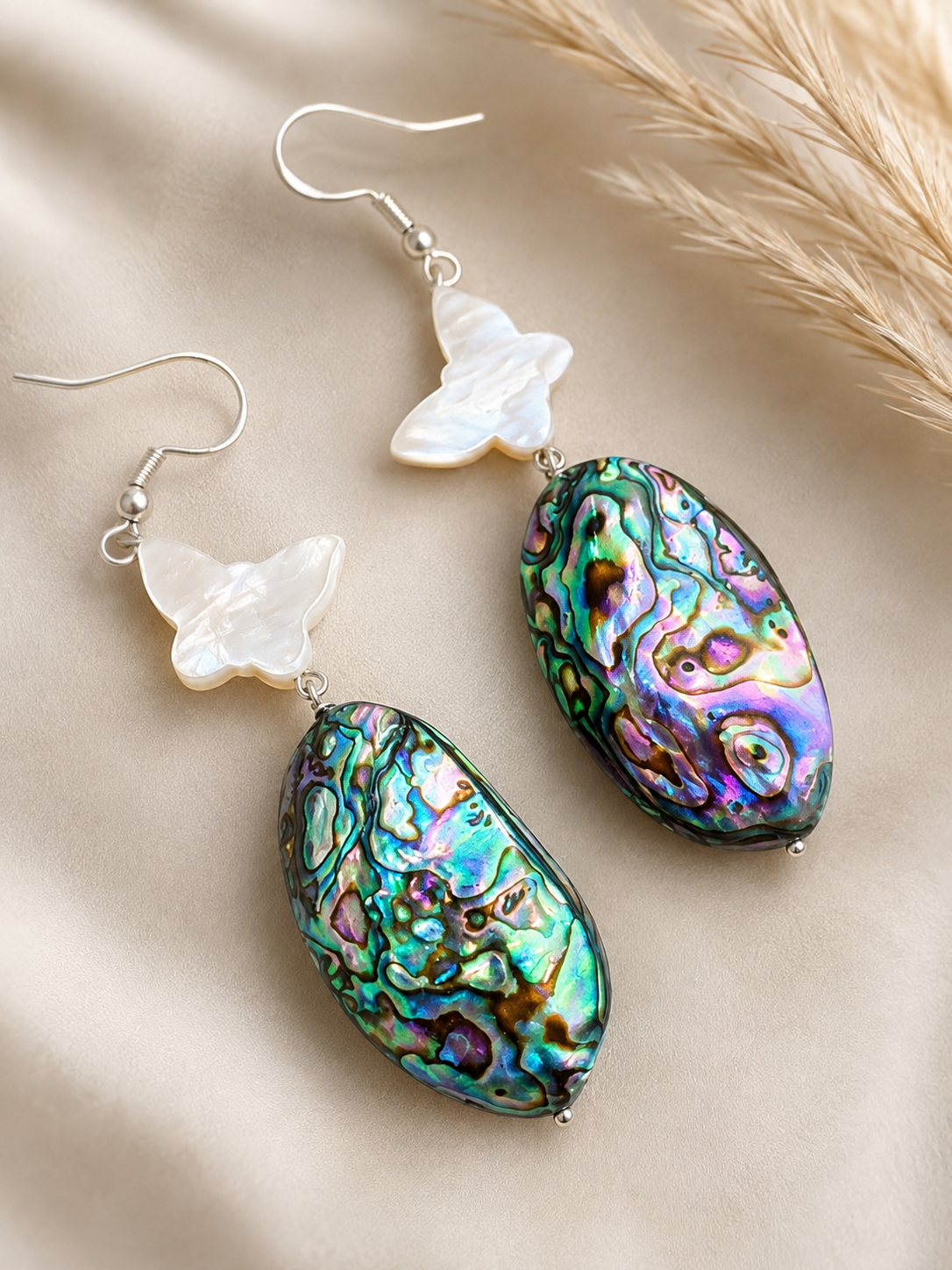 Abalone nugget earrings with small pale star-shaped accents