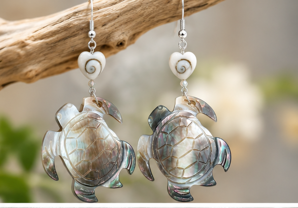 Iridescent turtle-shaped shell earrings with small spiral shell accents