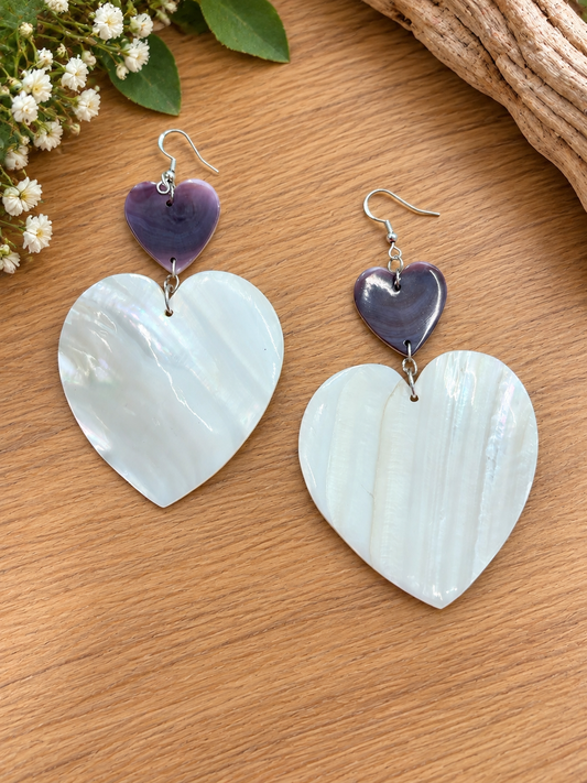 Mother-of-pearl heart earrings with smaller purple heart accents